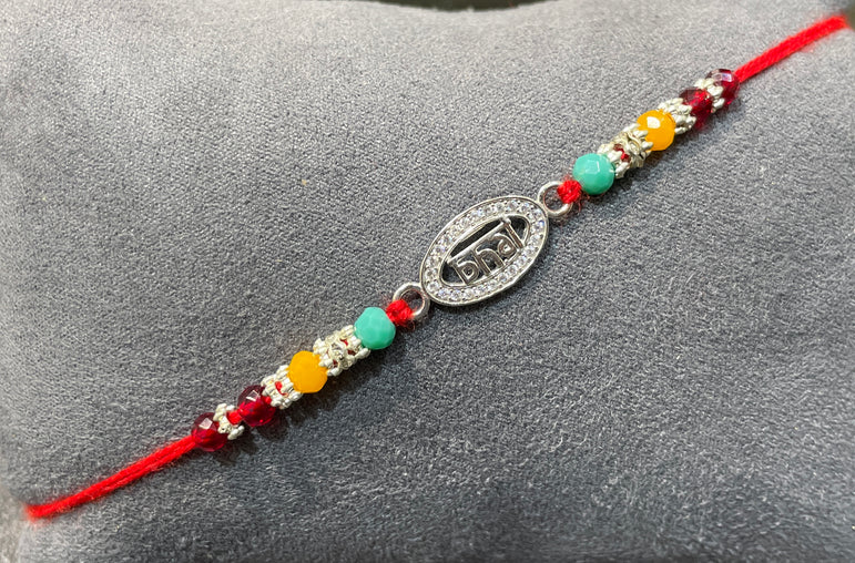 Elegant Oval Silver "Bhai" Rakhi