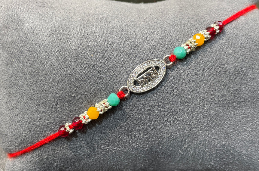 Elegant Oval Silver "Bhai" Rakhi