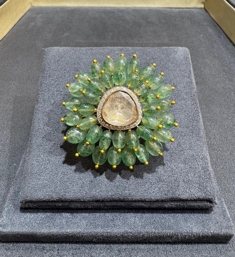 BIG POLKI RING WITH GREEN STONES