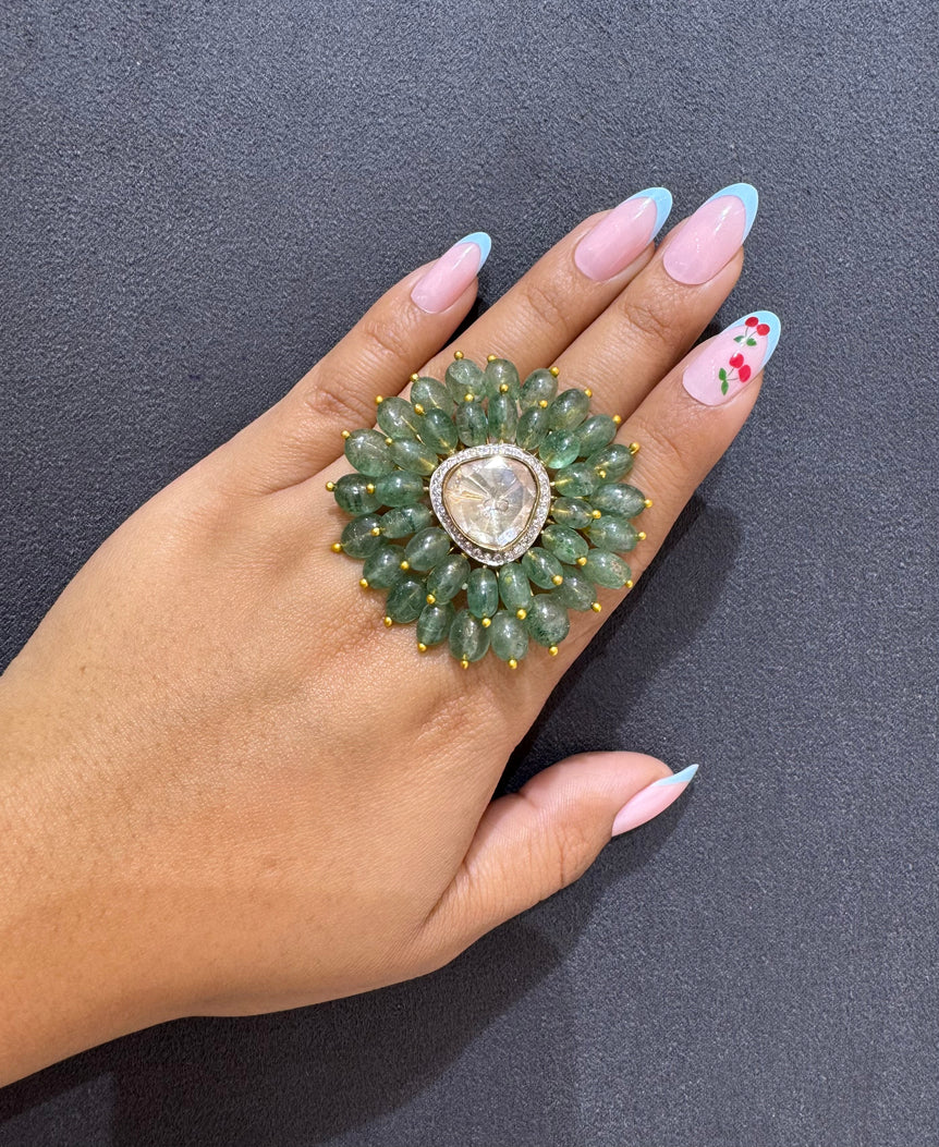 BIG POLKI RING WITH GREEN STONES