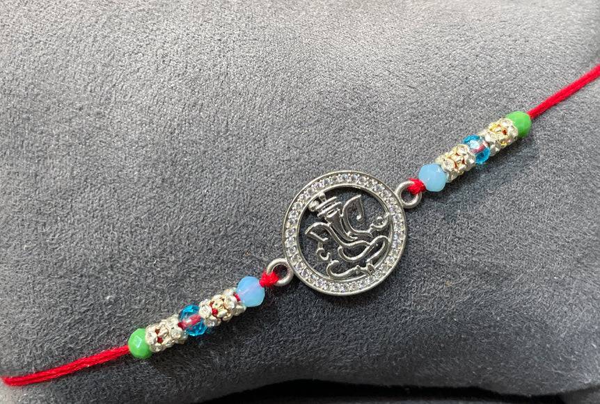 Ganesha Silver Rakhi with Moissanite Diamond Rakhi