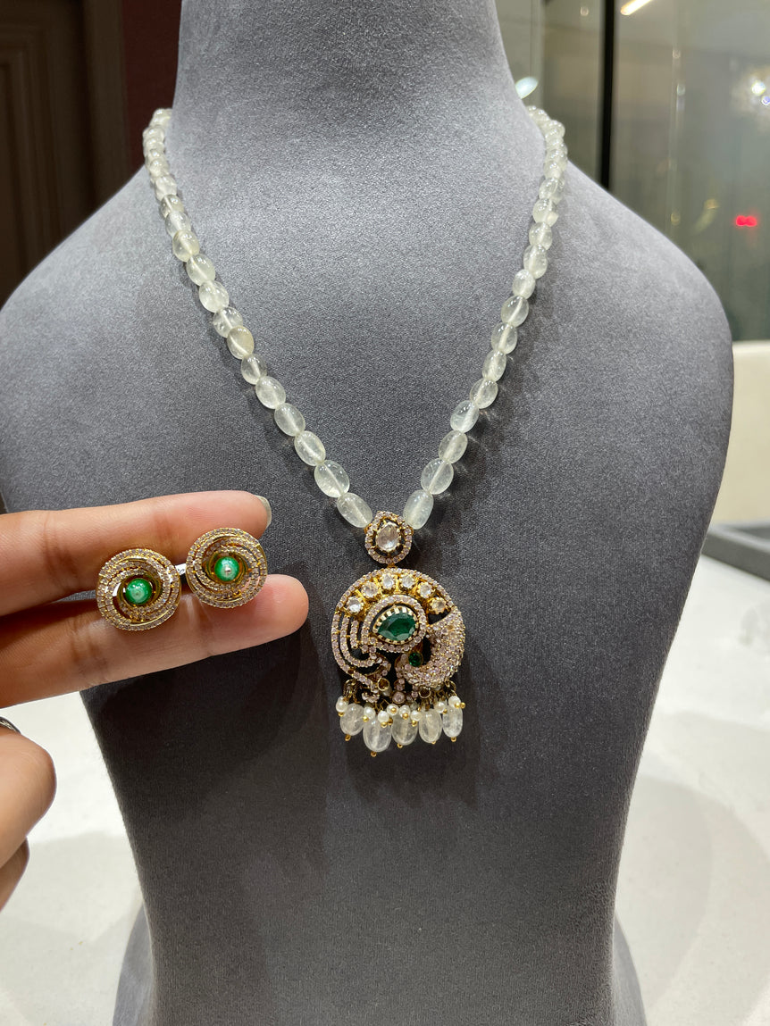 Heritage Gaja-Emerald Moissanite Polki Pendant Set