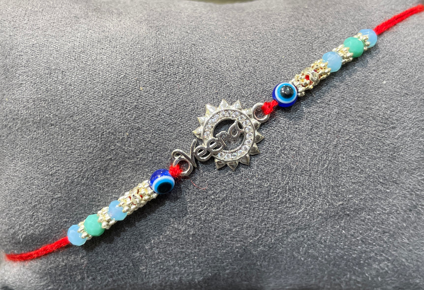 Veera" Sun-Shaped Rakhi with Evil Eye Rakhi